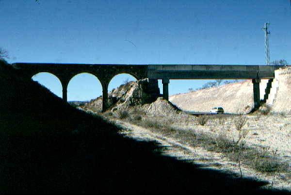 Original rail bridge extended across new road near Olula