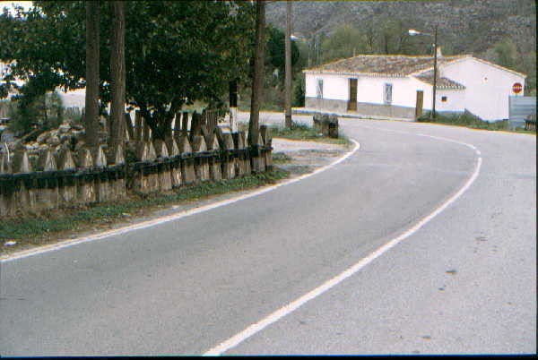 Sleepers used as a fence at Seron, the site of the level crossing is just behind