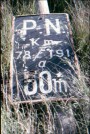 Level crossing sign at Fines